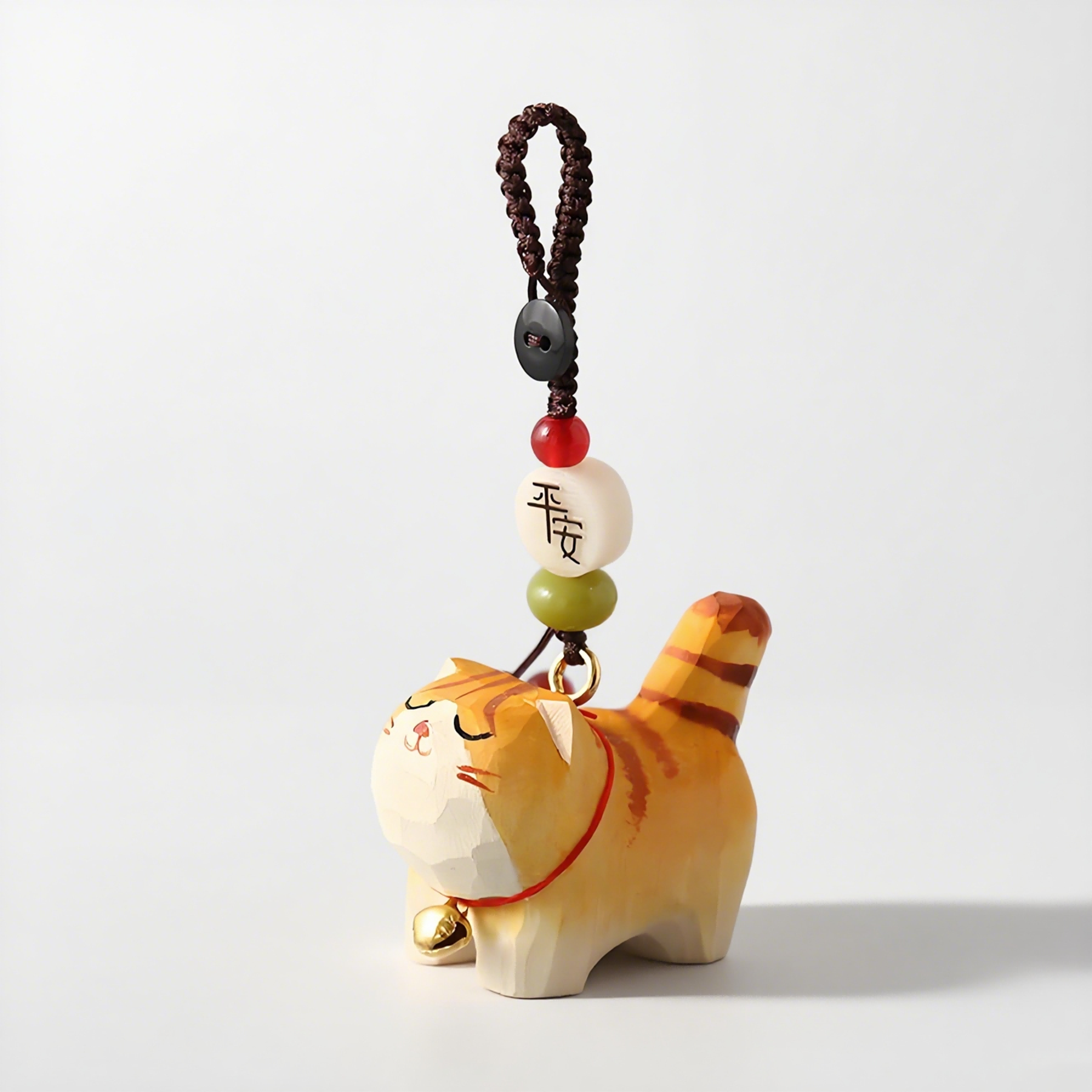 wood cat charm means peace